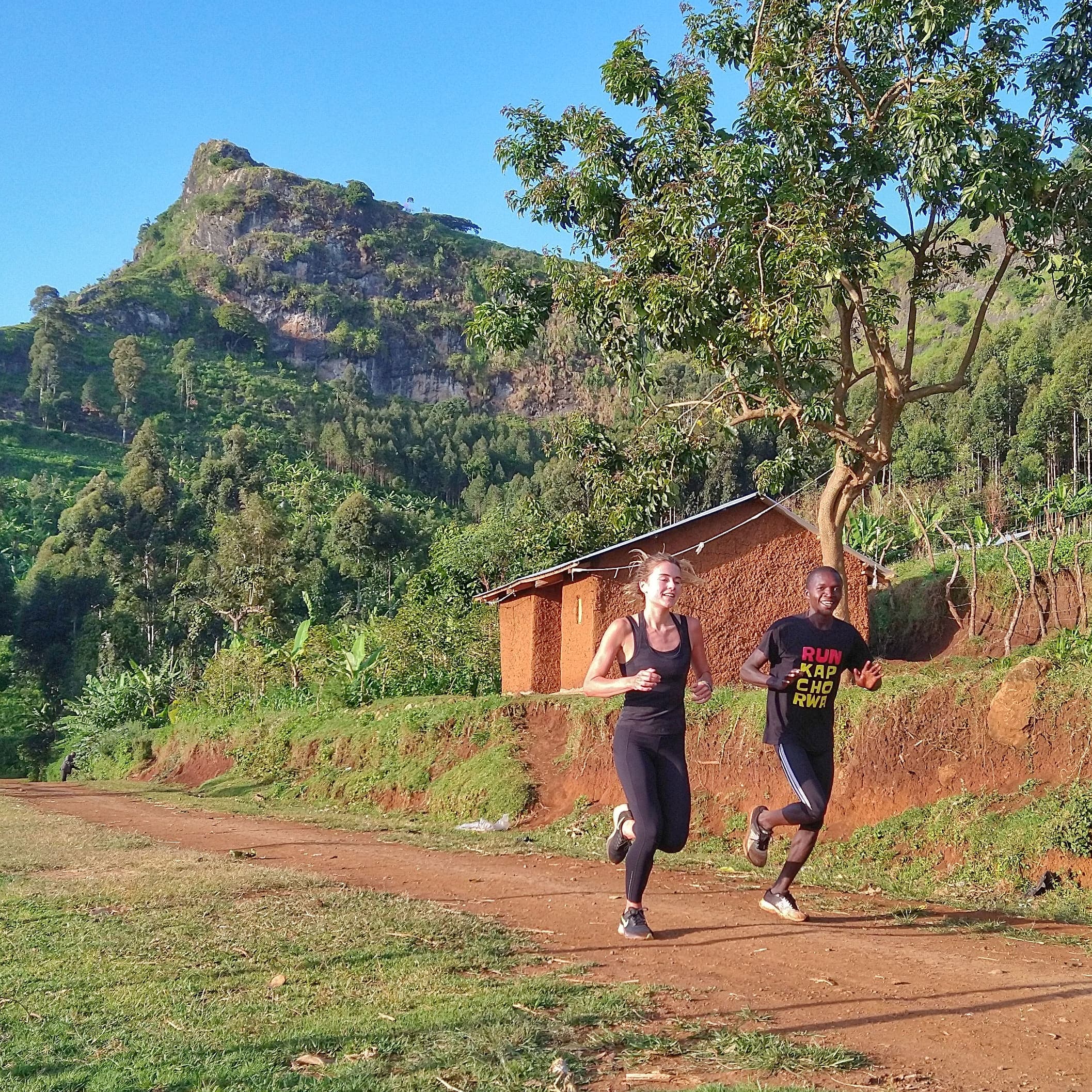 Guided run 'waterfall loop' US runner with guide & upcoming athlete Milton. Photo credit Run Kapchorwa @runkapchorwa-1764053417984.jpg
