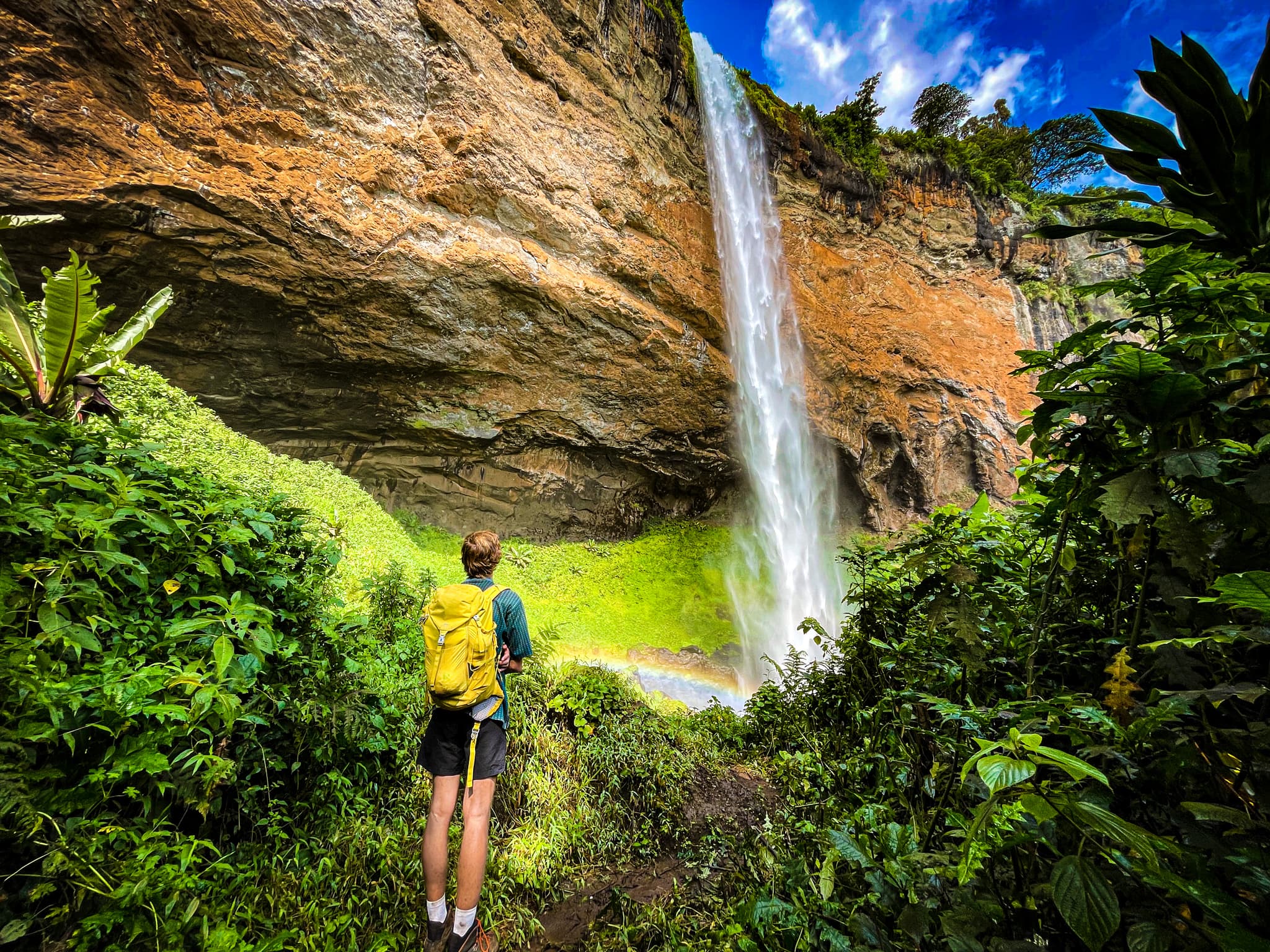 Hiker at Sipi main waterfall - photo taken by Juma Chebet-1772091889618.jpg